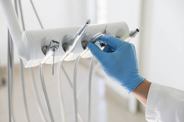 Professional Tooth Extraction technician working in Basehor, KS